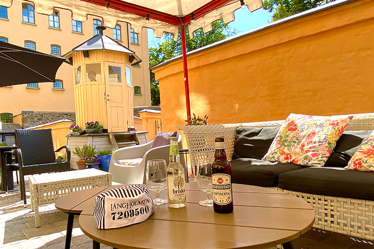 Rastgården på Långholmen Hotell Sittplatser ute i Rastgården på Långholmen Hotell